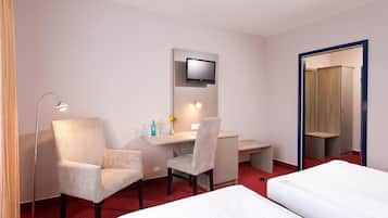 Minibar, desk, laptop workspace, cots/infant beds