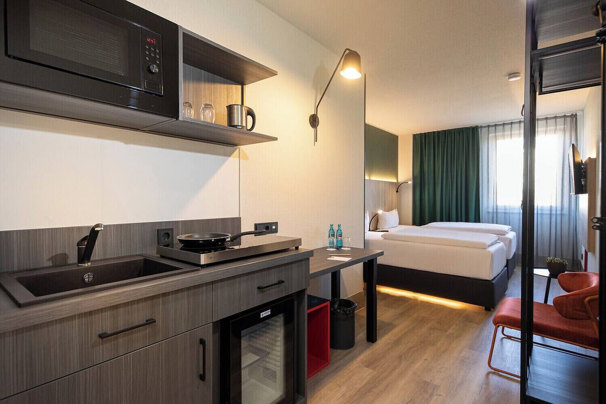 Quarto duplo (Studio) | Cofres nos quartos, escrivaninha, ferros/tábuas de passar roupa