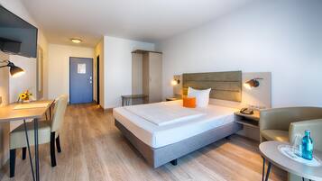 Hypo-allergenic bedding, desk, blackout drapes, soundproofing