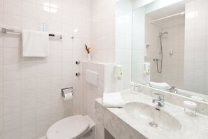 Shower, eco-friendly toiletries, hair dryer, towels