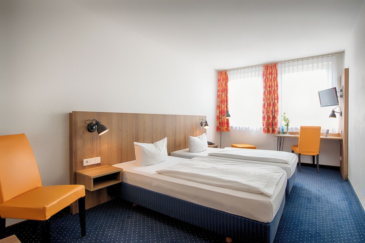 Desk, WiFi (free), bed sheets
