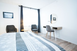 Quarto standard | Sala de estar | TV de tela plana