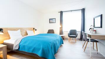 Comfort Room | Desk, blackout drapes, free WiFi, bed sheets