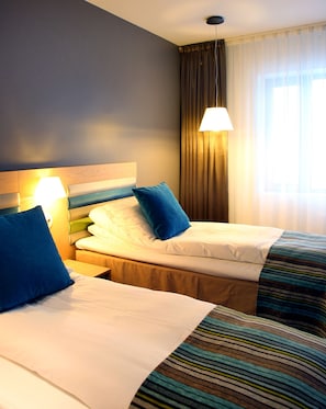 Standard-Zweibettzimmer, Nichtraucher | Minibar, kostenloses WLAN, Bettwäsche, Wecker
