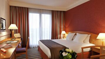 Premium bedding, in-room safe, desk, soundproofing