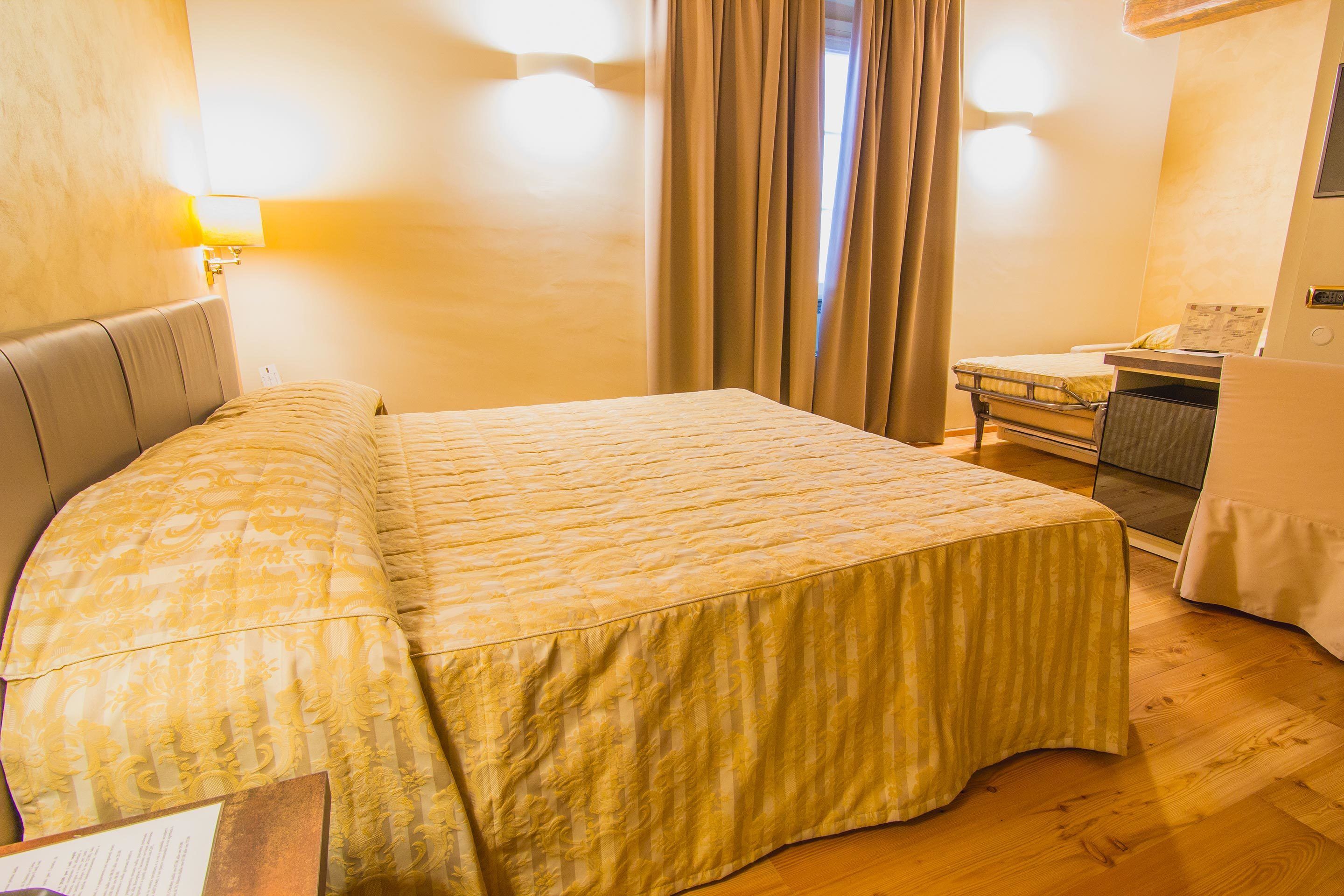 ห้องแฟมิลี่ทริปเปิล, วิวสวน | ผ้านวมขนเป็ด, เตียง Select Comfort, มินิบาร์, ตู้นิรภัยในห้องพัก