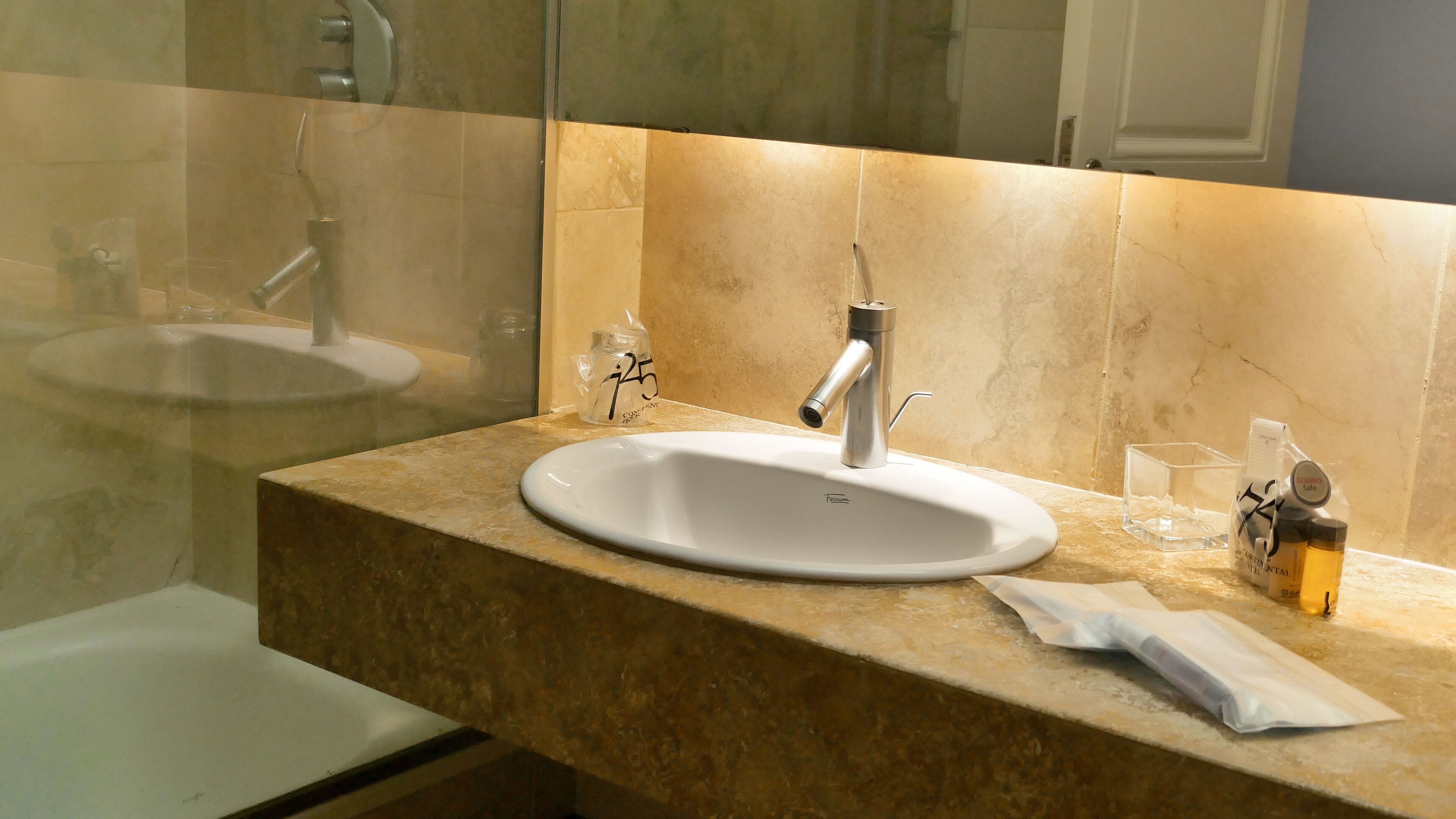 combined shower/bathtub, deep-soaking bathtub, rainfall showerhead