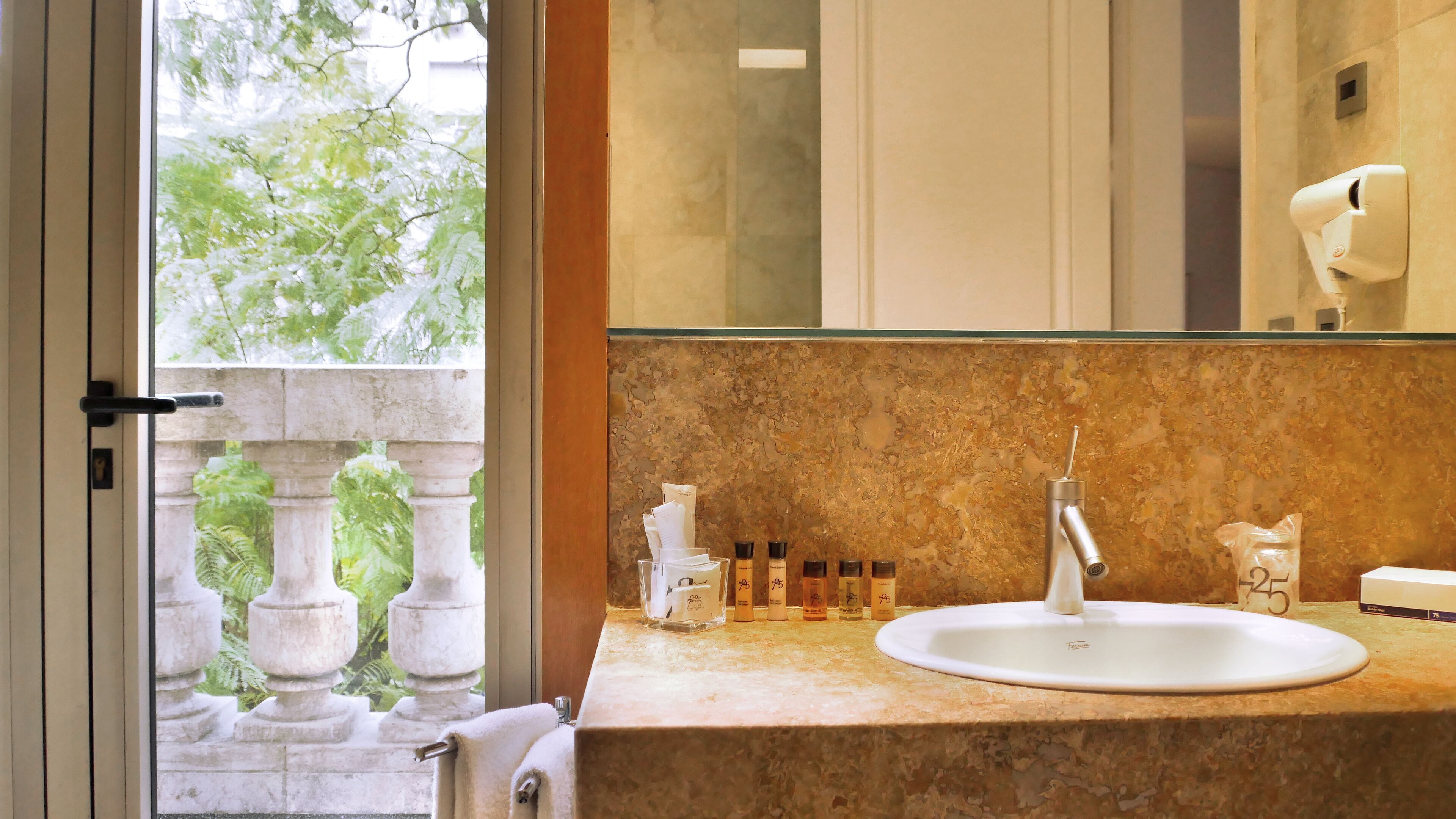 combined shower/bathtub, deep-soaking bathtub, rainfall showerhead