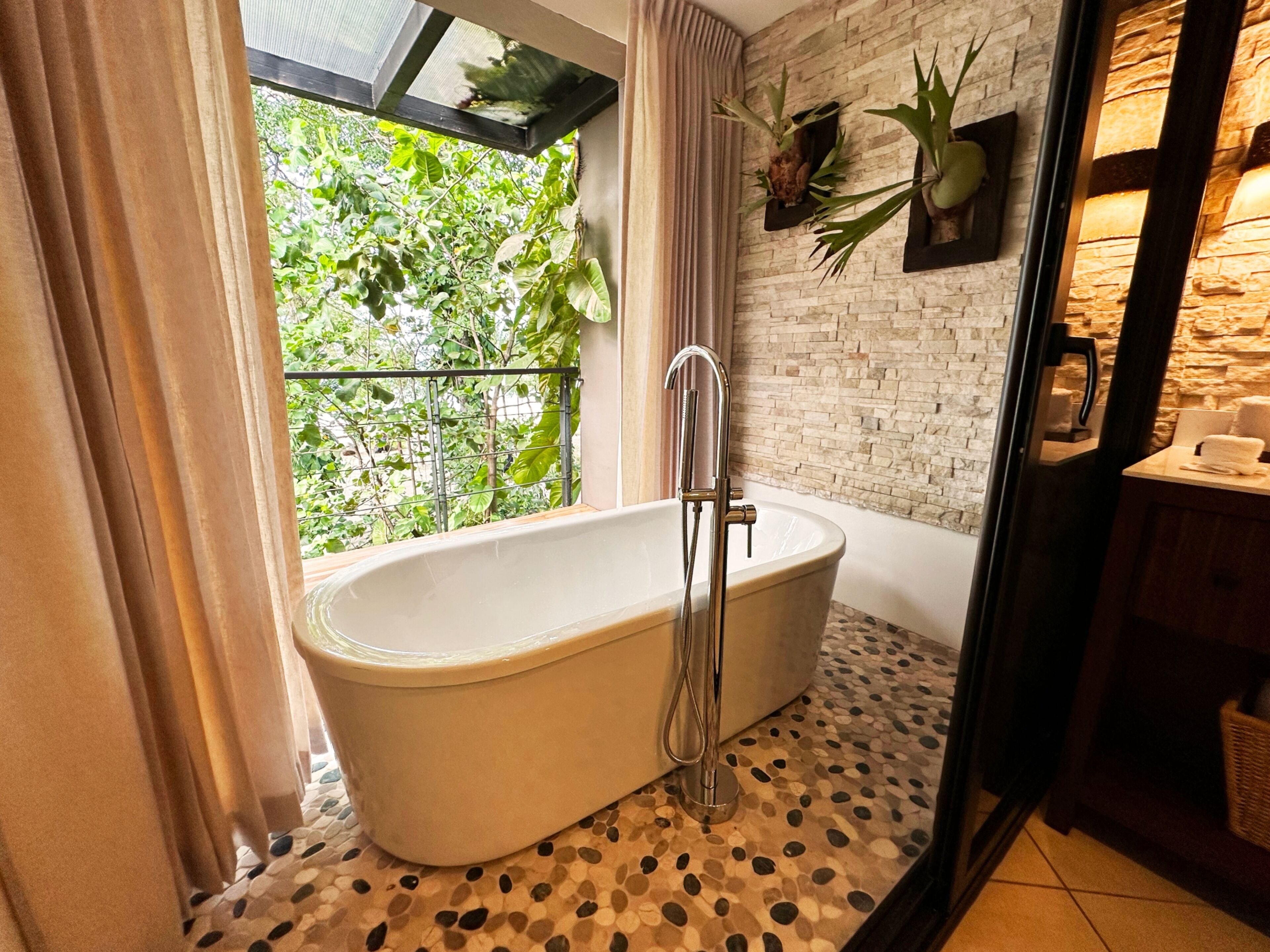 eco-friendly toiletries, hair dryer, towels, shampoo