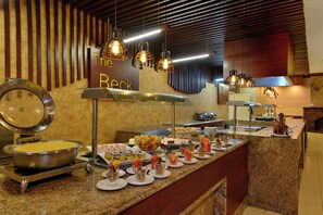 Breakfast, lunch, dinner served; local cuisine 