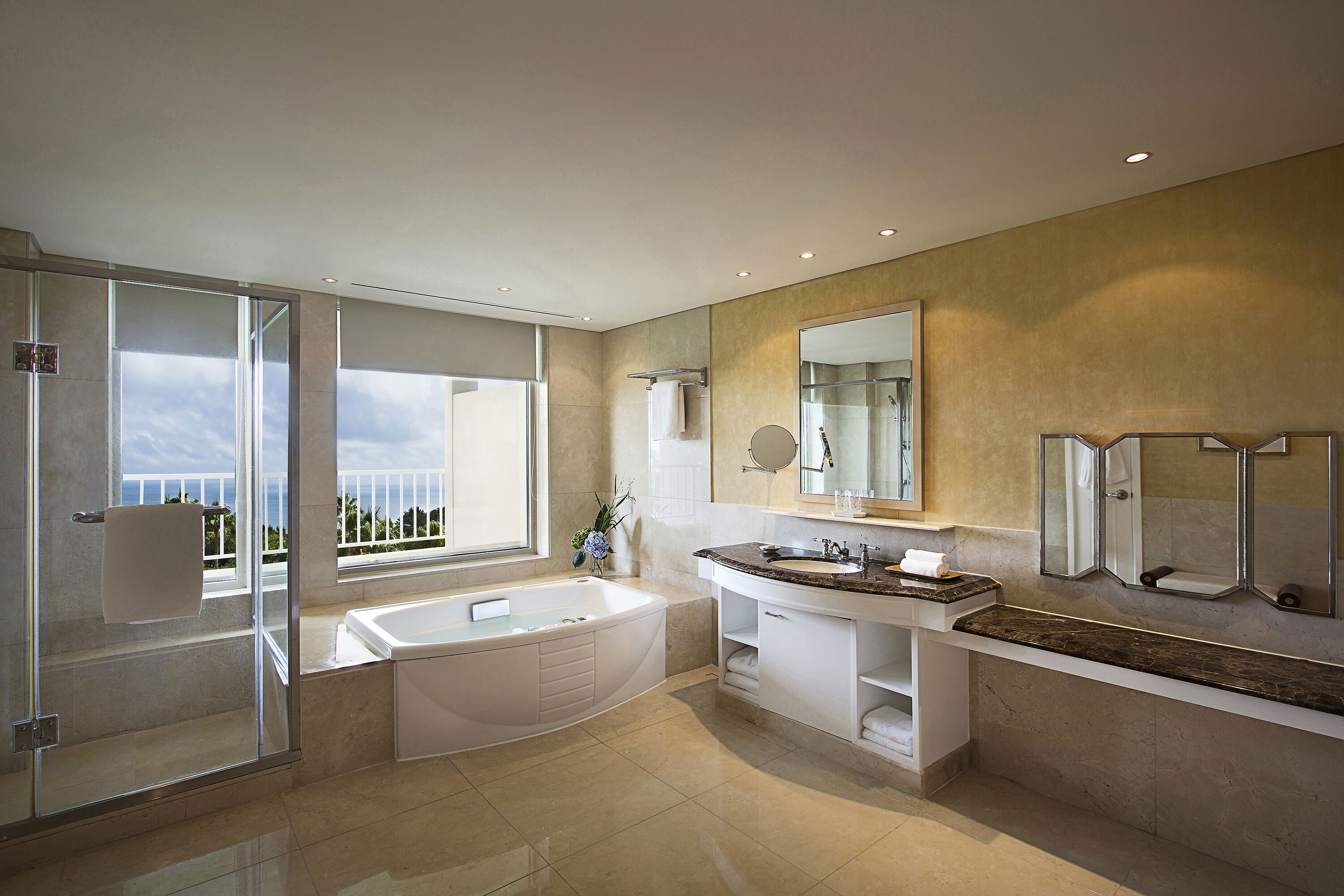 premier suite garden | bathroom | separate bathtub and shower, deep-soaking bathtub, designer toiletries