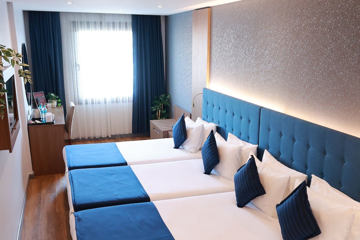 Familie vierpersoonskamer | 1 slaapkamer, lakens van Egyptisch katoen, luxe beddengoed, een minibar