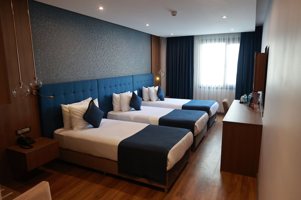 Familie driepersoonskamer | 1 slaapkamer, lakens van Egyptisch katoen, luxe beddengoed, een minibar