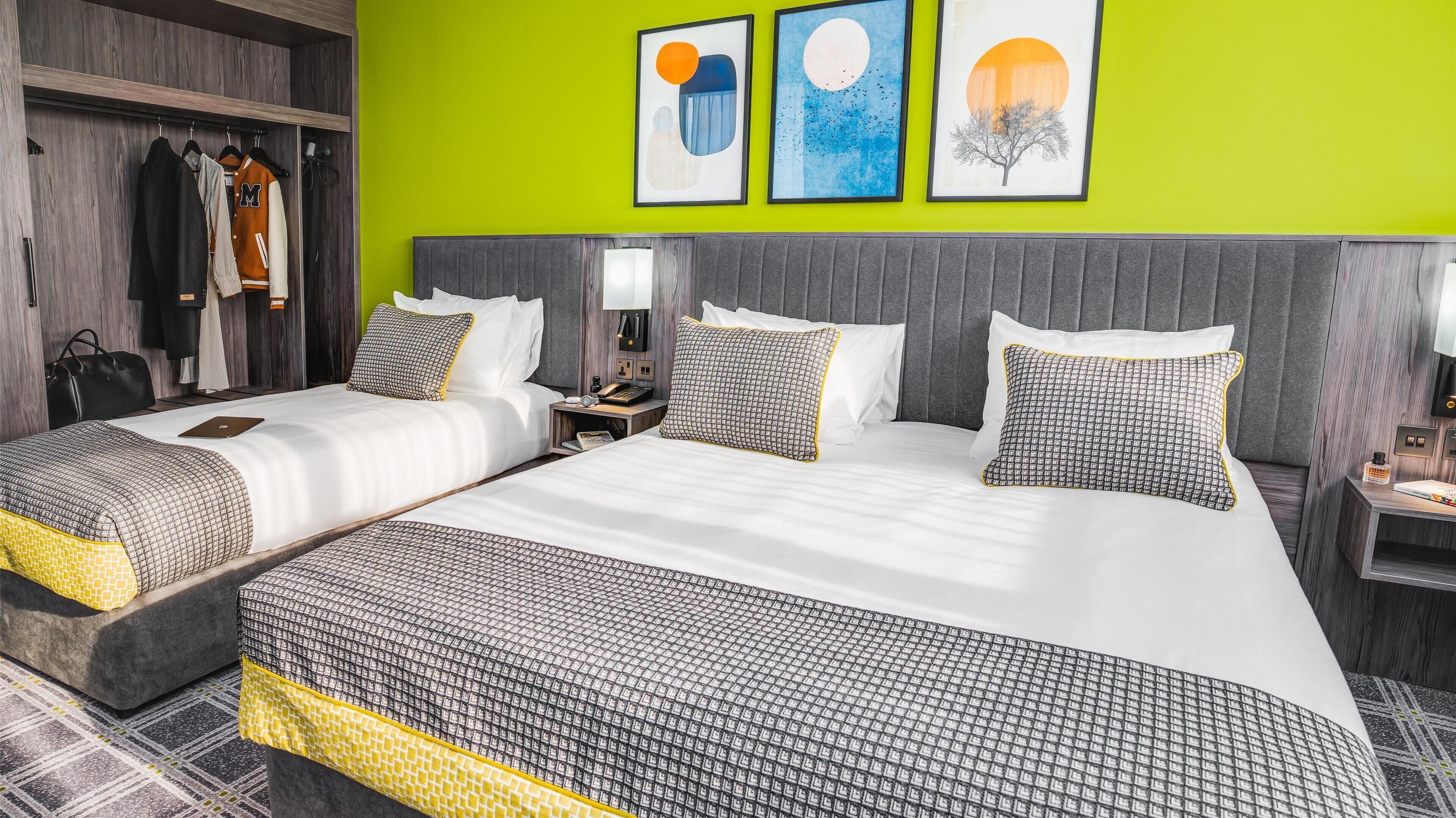 family room | 1 bedroom, premium bedding, in-room safe, desk