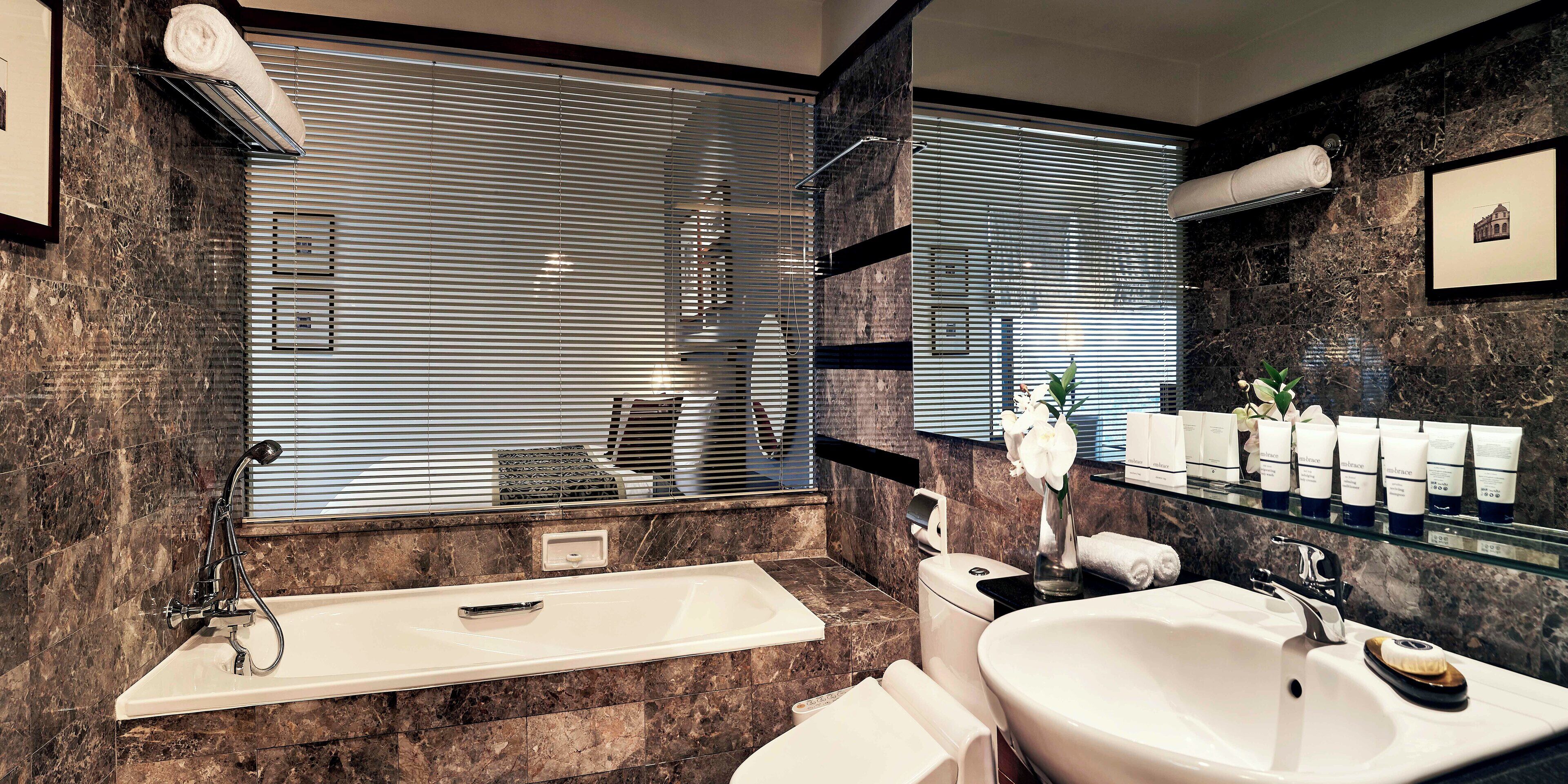 combined shower/bathtub, free toiletries, hair dryer, bathrobes