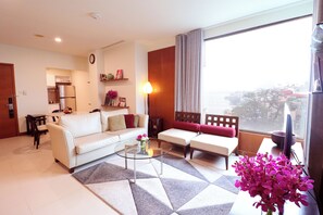 Lägenhet Executive | Vardagsrum | Platt-tv