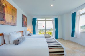 Suite, 2 Bedrooms, Sea View | In-room safe, desk, iron/ironing board, free WiFi