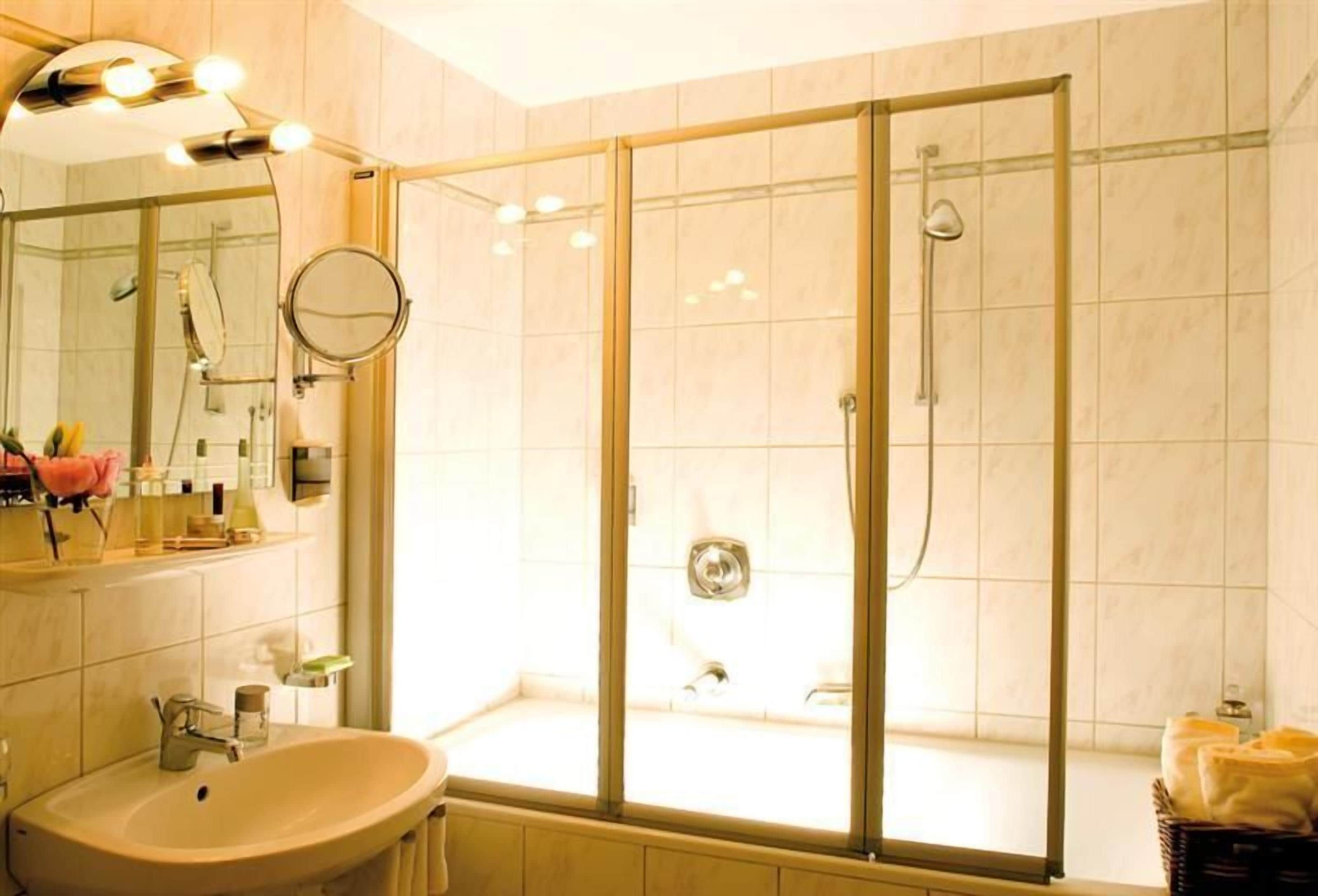 standard double room | bathroom | hair dryer, towels