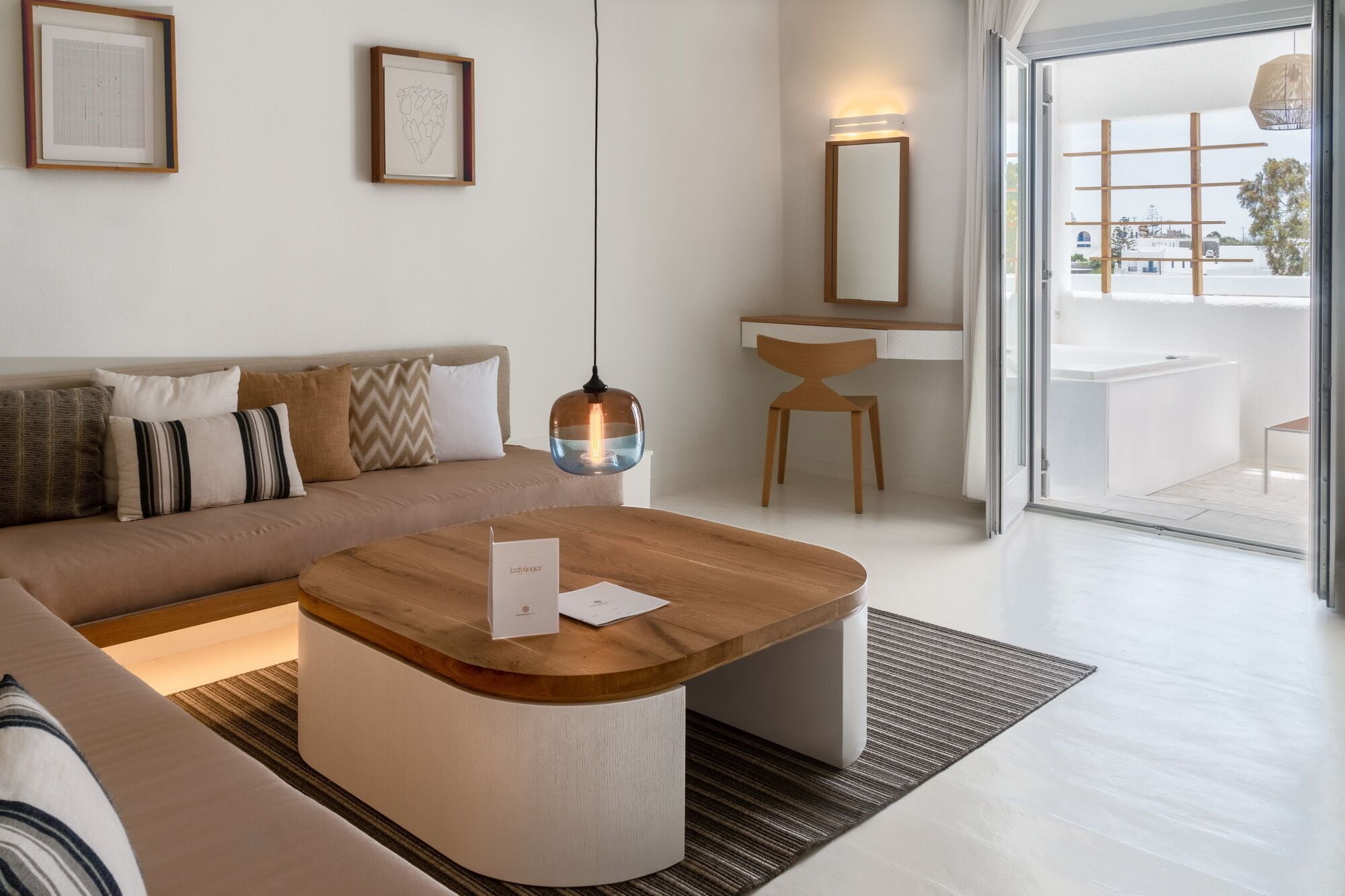 junior suite, hot tub, pool view | living area | 21-inch lcd tv with satellite channels, tv, mp3 dock