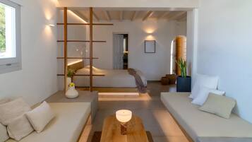 Junior Suite, Hot Tub, Sea View | Minibar, in-room safe, desk, iron/ironing board