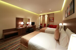 Premium bedding, down comforters, minibar, in-room safe