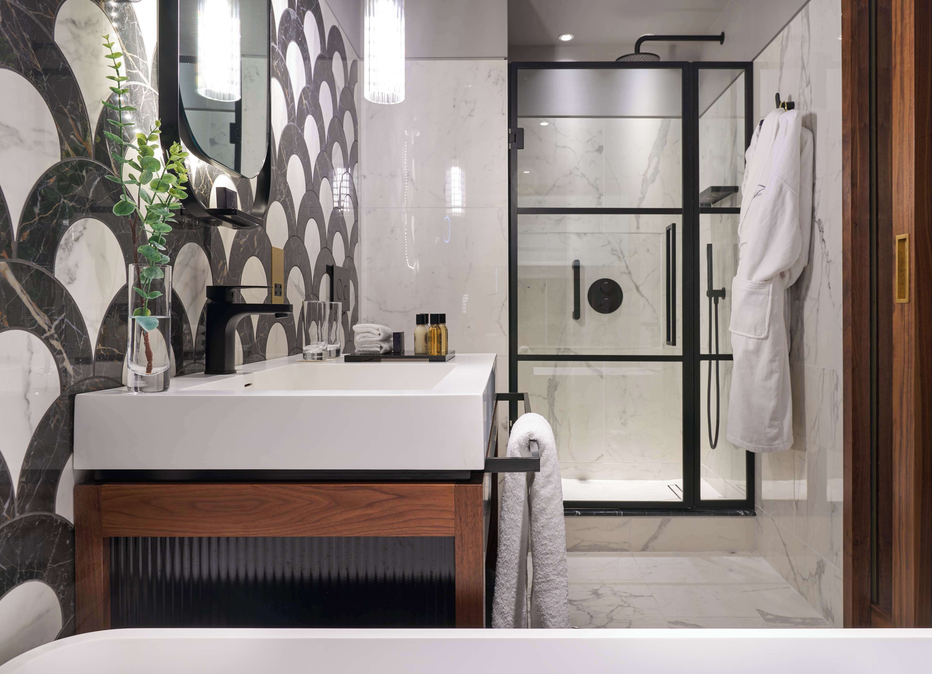 eco-friendly toiletries, hair dryer, bathrobes, slippers