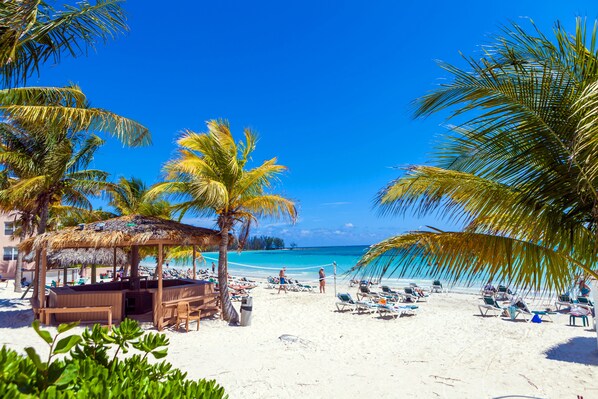 Private beach, white sand, sun loungers