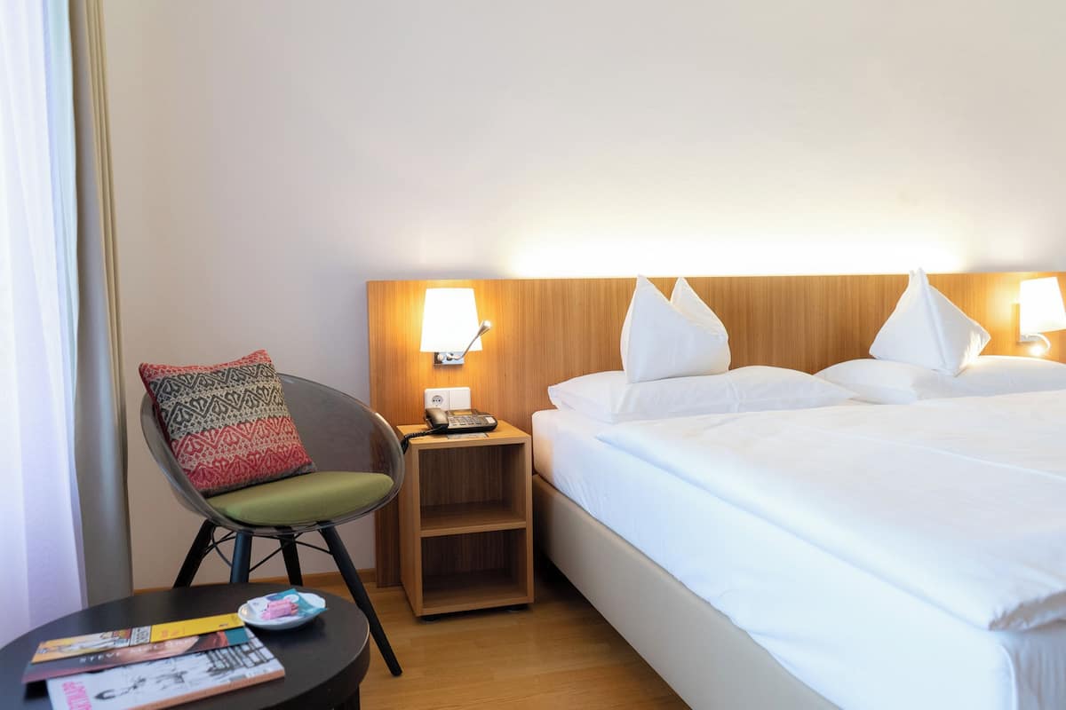 Deluxe Single Room | 1 bedroom, down comforters, pillowtop beds, in-room safe