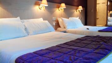 Ropa de cama de alta calidad y colchones con acolchado adicional