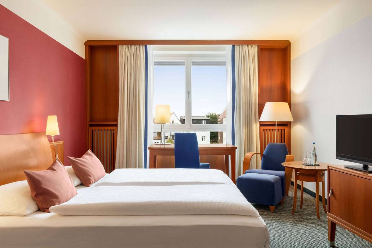 deluxe double room | premium bedding, in-room safe, desk, laptop workspace