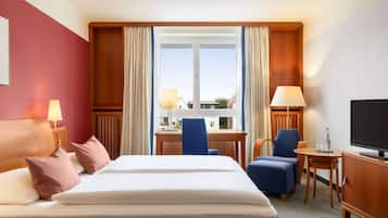 Chambre Double Deluxe | Literie de qualité supérieure, coffres-forts dans les chambres, bureau