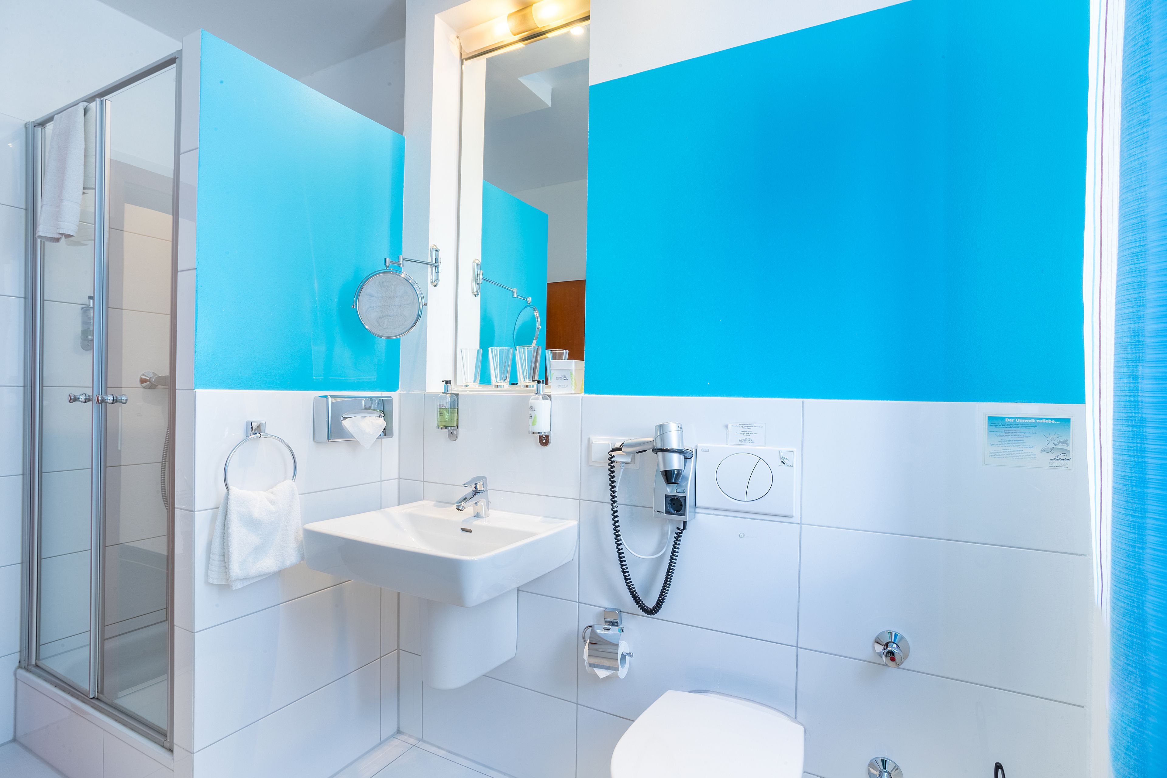 junior suite | bathroom | hair dryer, towels