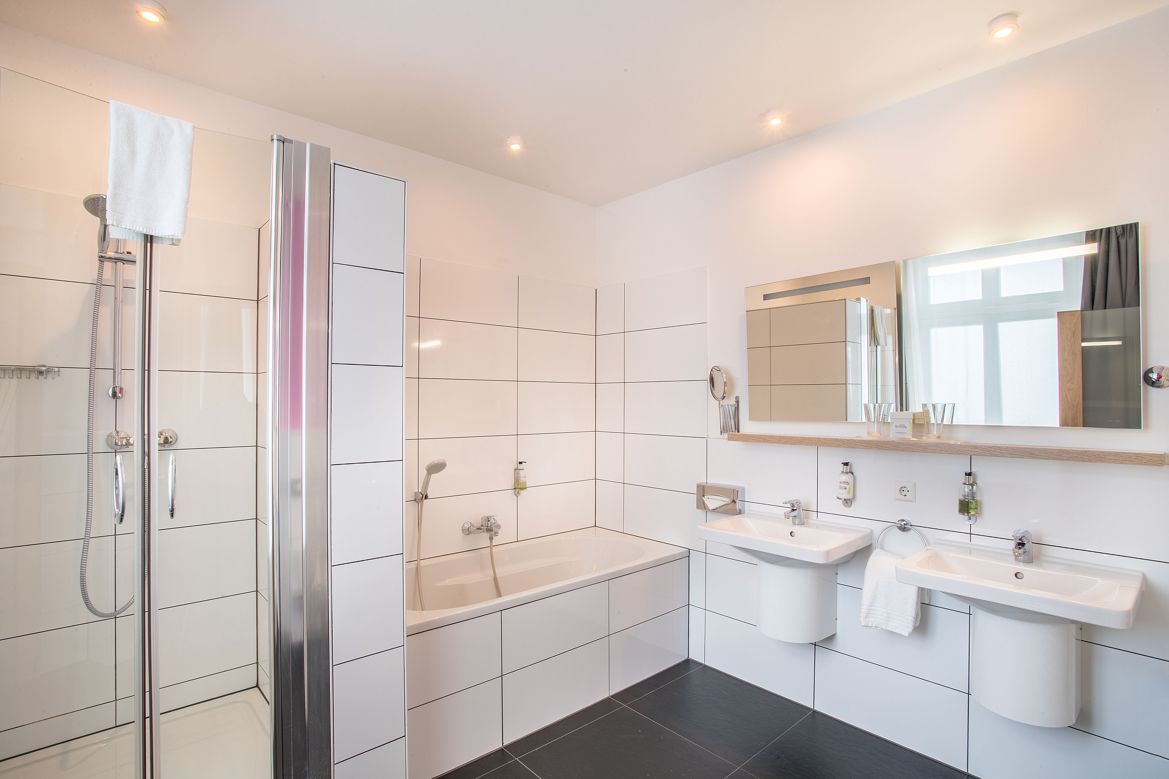 superior double room | bathroom | hair dryer, towels