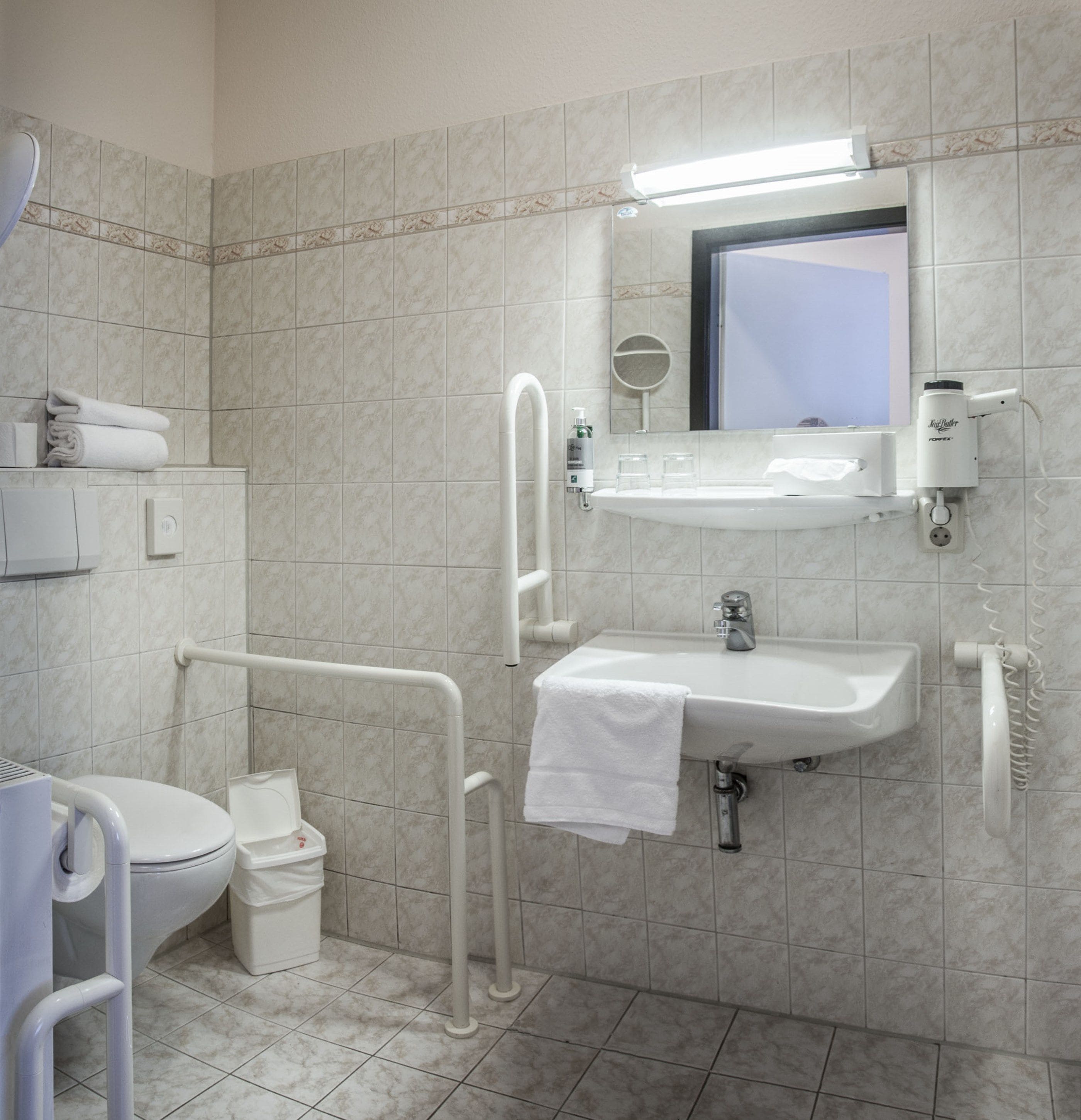 shower, free toiletries, hair dryer, towels