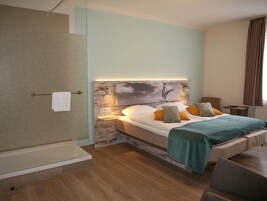 Ropa de cama hipoalergénica, minibar y decoración personalizada 