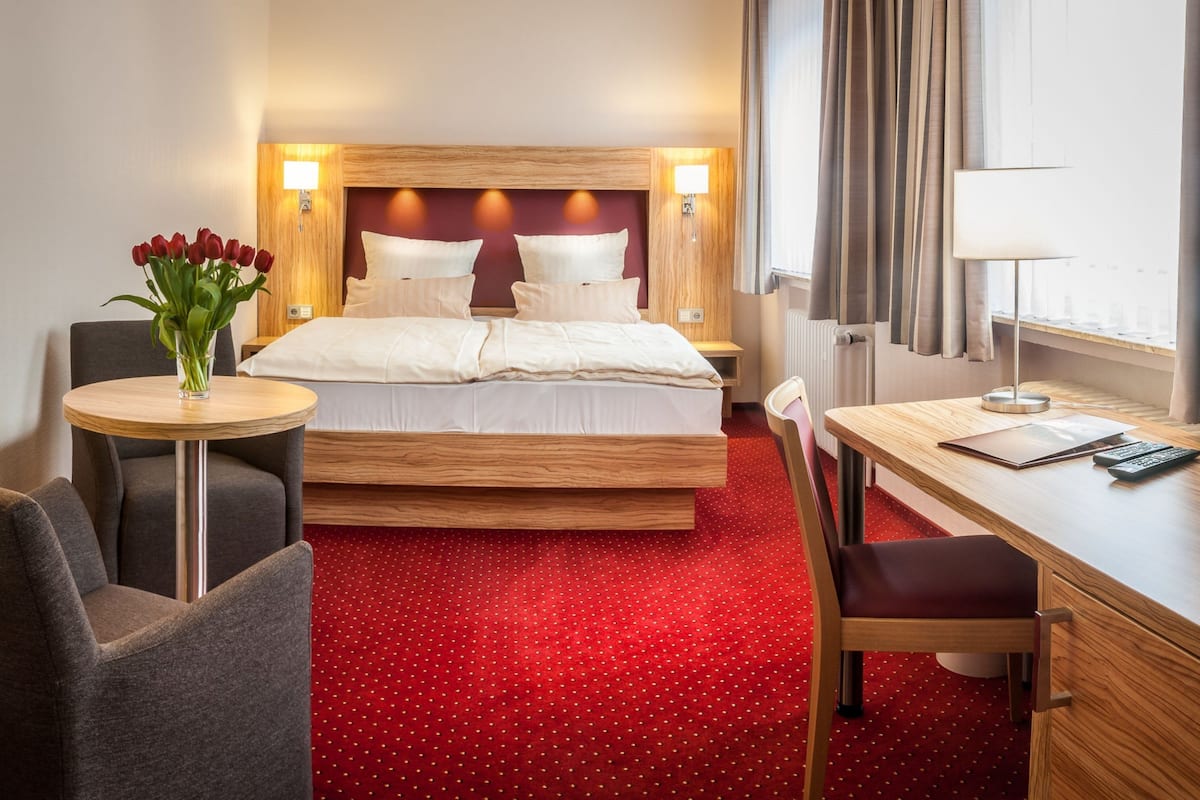 Dreibettzimmer | Allergikerbettwaren, Minibar, individuell dekoriert
