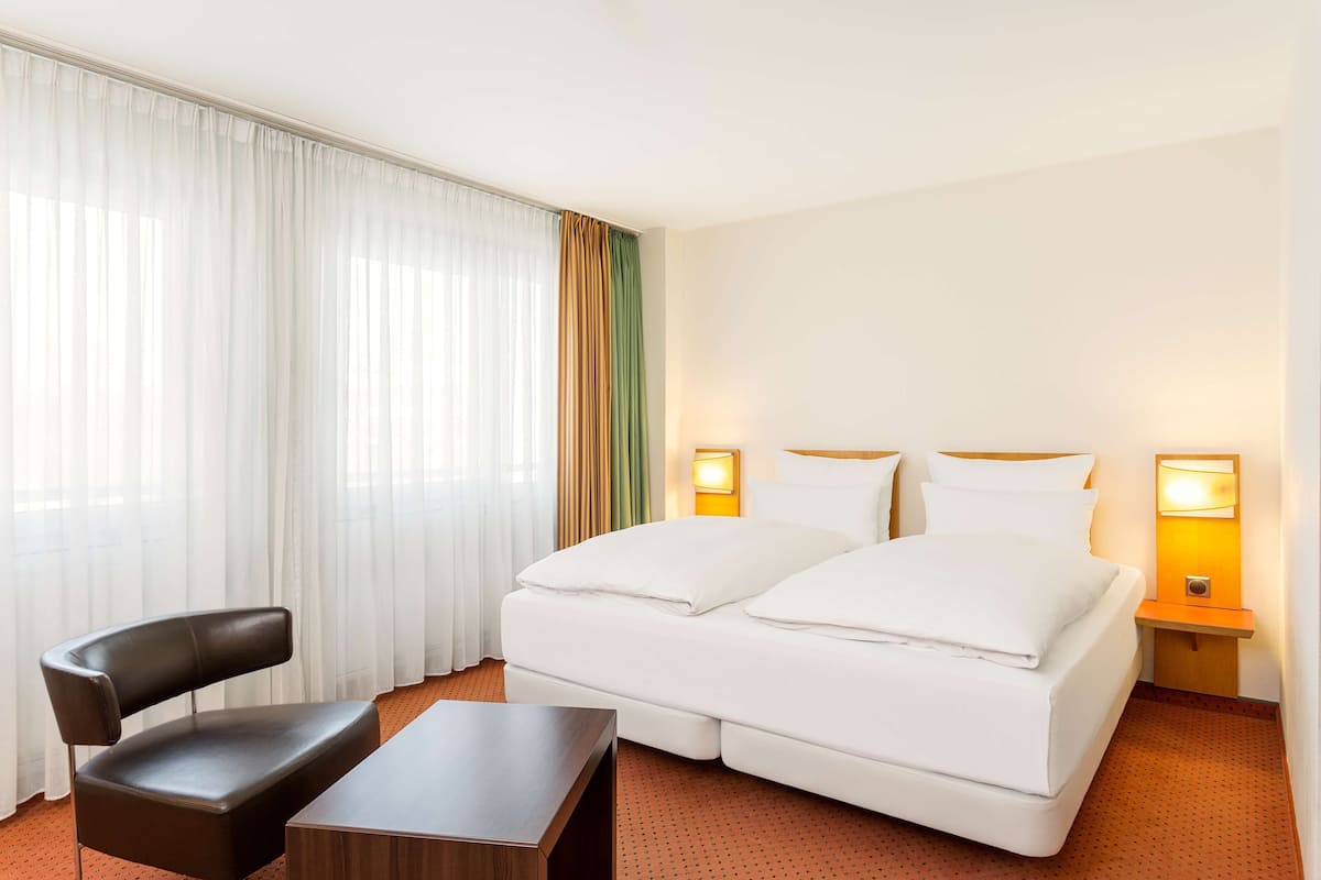 Premium bedding, pillow-top beds, minibar, in-room safe