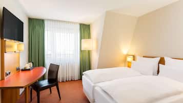 Premium bedding, pillowtop beds, minibar, in-room safe
