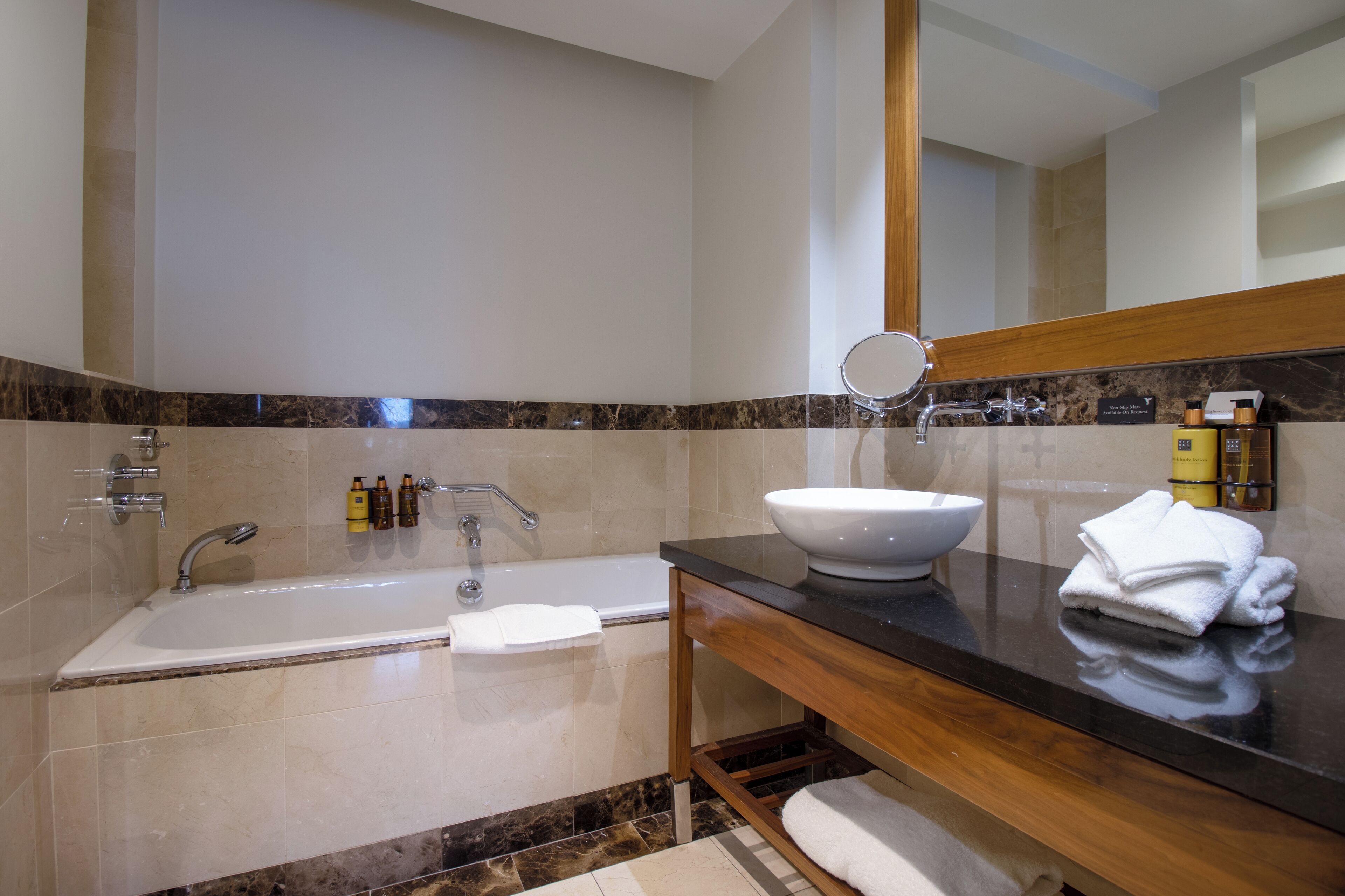 combined shower/bathtub, free toiletries, hair dryer, bathrobes