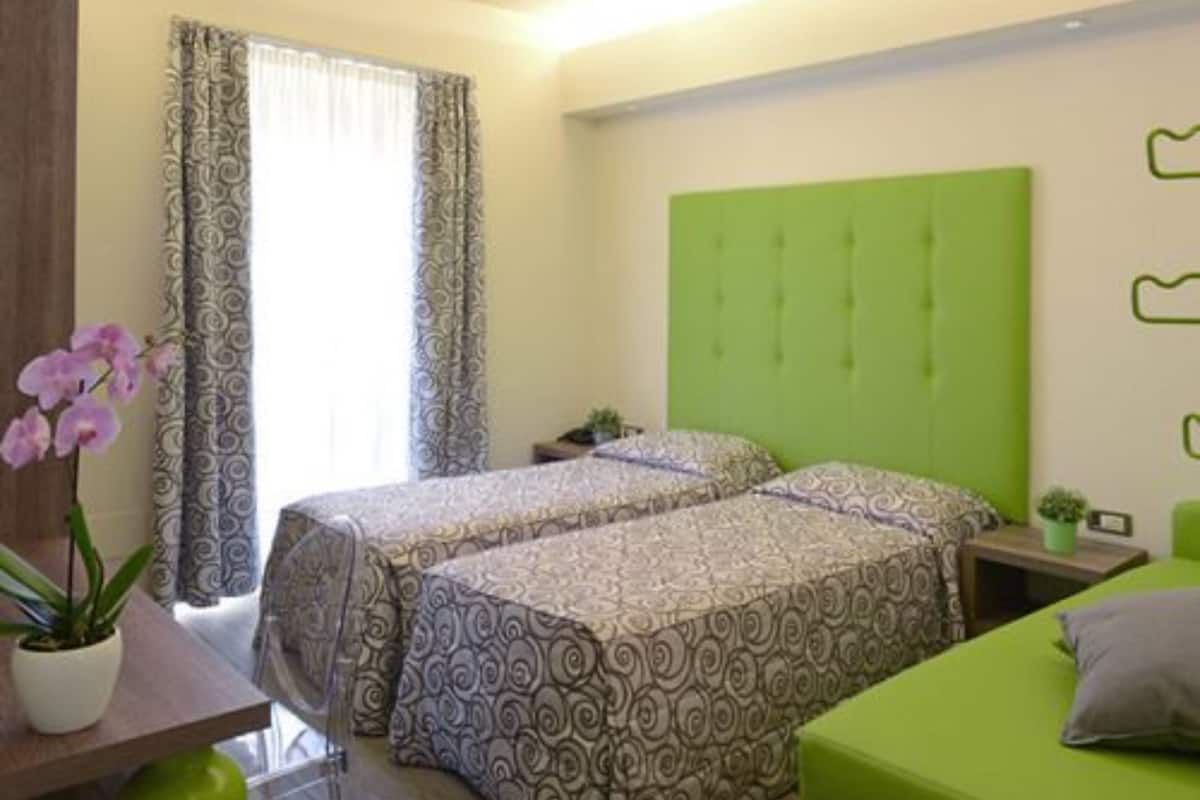Premium bedding, down comforters, minibar, in-room safe