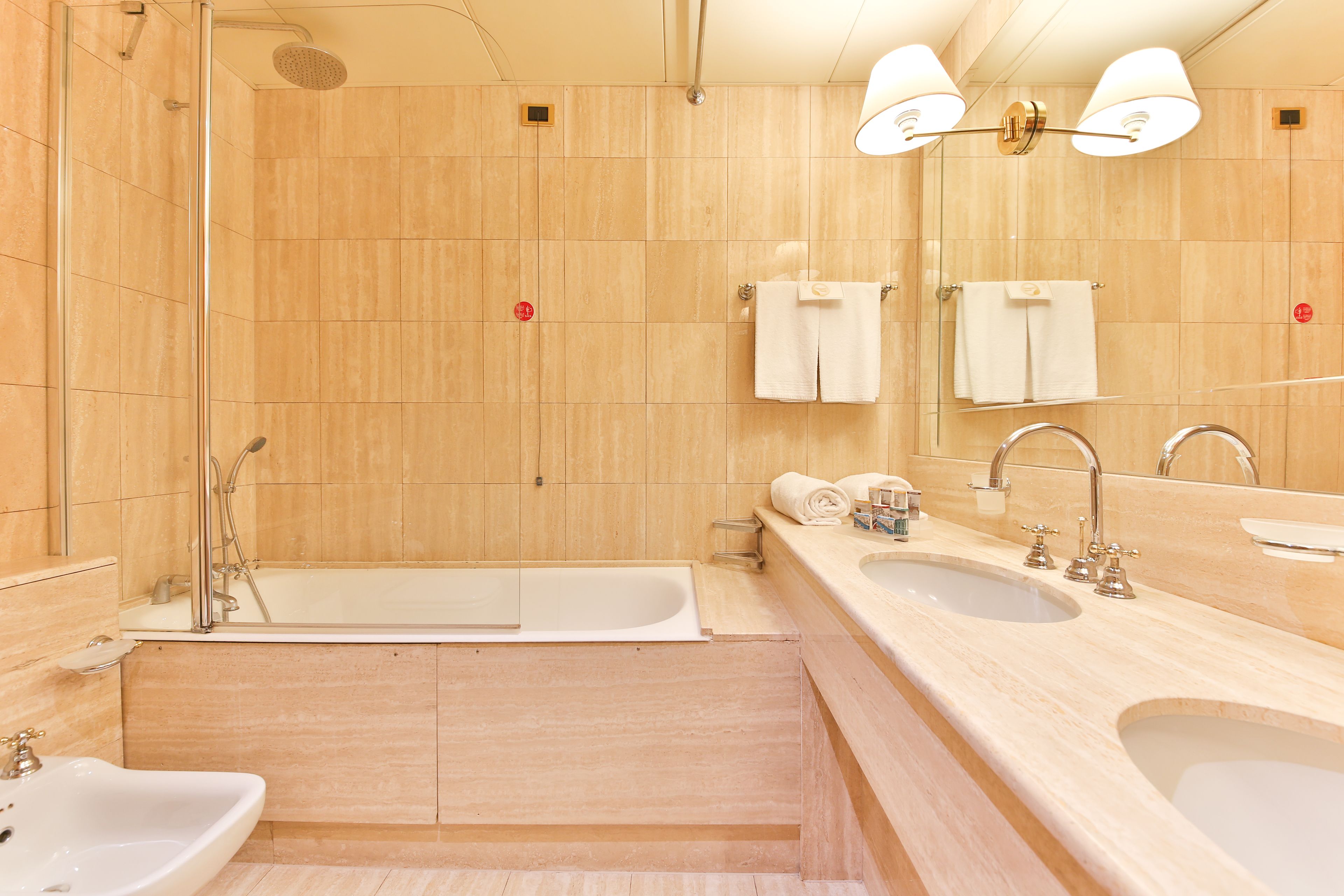 free toiletries, hair dryer, slippers, bidet