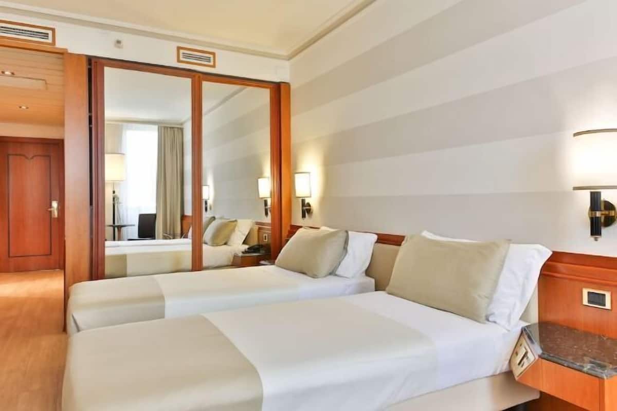 1 bedroom, down comforters, memory foam beds, minibar