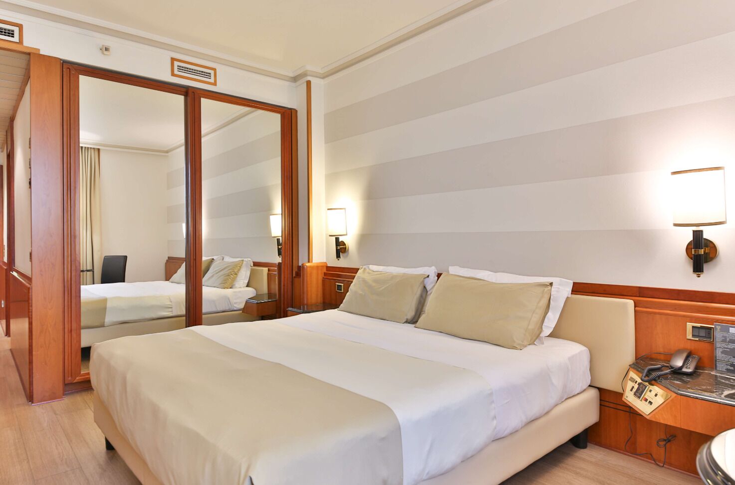 Down duvets, memory-foam beds, minibar, in-room safe