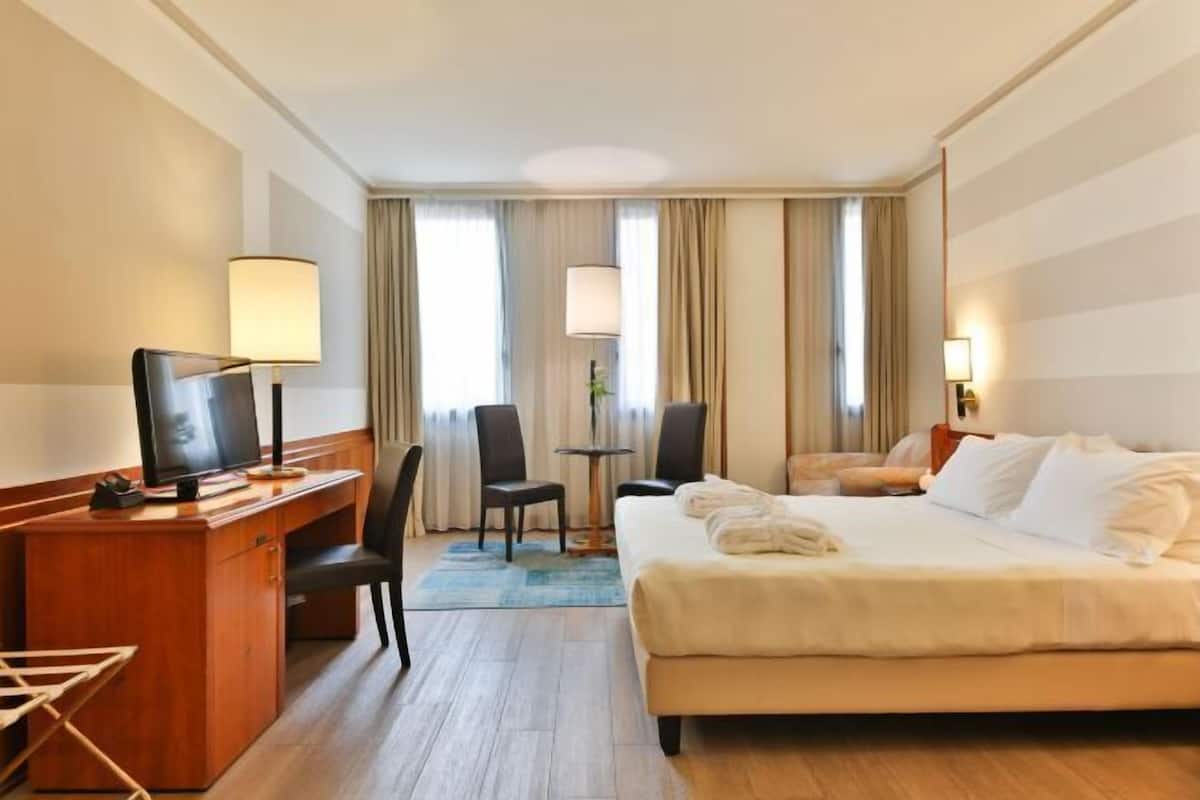 1 bedroom, down comforters, memory foam beds, minibar