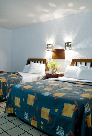 Premium bedding, iron/ironing board, free rollaway beds, free WiFi
