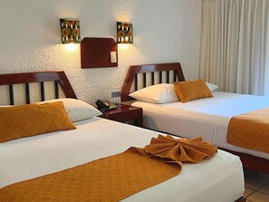 Premium bedding, iron/ironing board, free rollaway beds, free WiFi