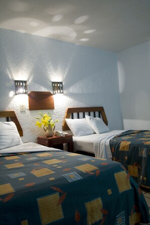 Premium bedding, iron/ironing board, free rollaway beds, free WiFi