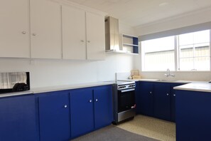 Appartement Deluxe, 2 chambres | Cuisine privée | Micro-ondes, plaque de cuisson, bouilloire électrique, grille-pain