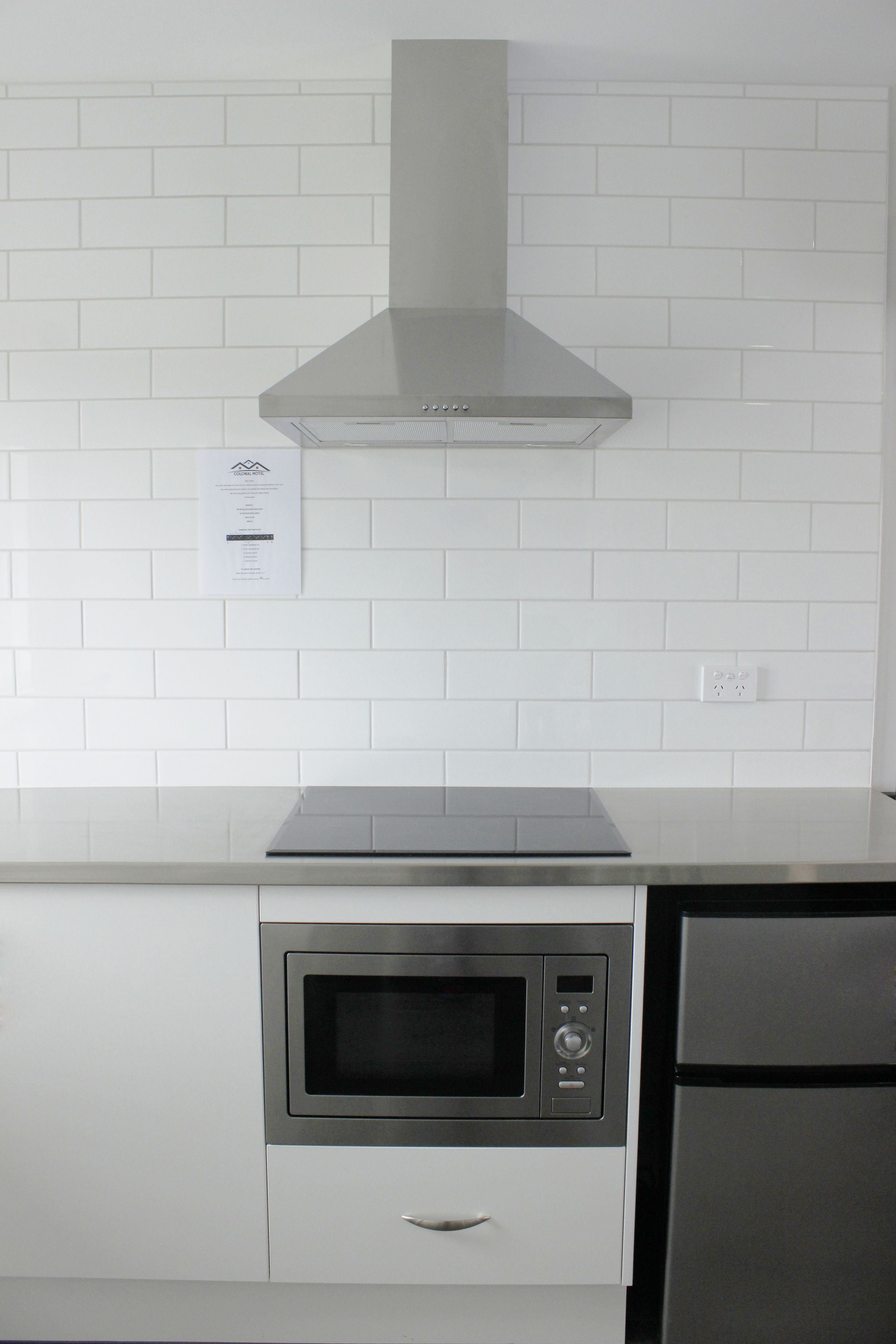 Superior appartement, 2 slaapkamers | Privékeuken | Een microgolfoven, een kookplaat, een waterkoker, een broodrooster