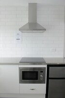 Superior Apartment, 2 Bedrooms | Private kitchen | Microwave, stovetop, electric kettle, toaster